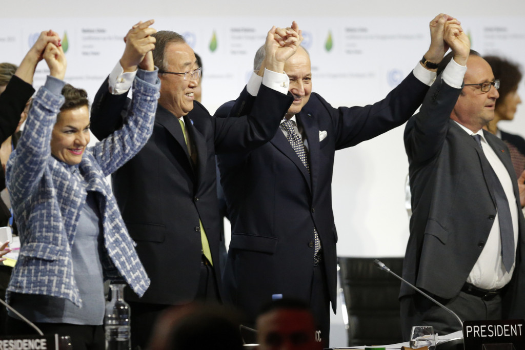 From L-R, Christiana Figueres, Executive Secretary of the UN Framework Convention on Climate Change, United Nations Secretary-General Ban Ki-moon, French Foreign Affairs Minister Laurent Fabius, President-designate of COP21 and French President Francois Hollande react during the final plenary session at the World Climate Change Conference 2015 (COP21) at Le Bourget, near Paris, France, December 12, 2015. REUTERS/Stephane Mahe TPX IMAGES OF THE DAY - RTX1YERL